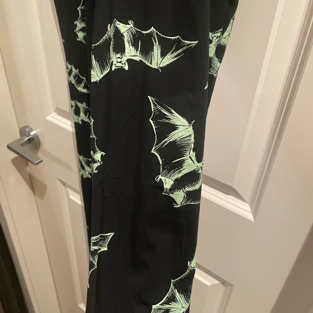 Dolls Kill Black Leggings with Green Bat Design - Picture 2 of 5